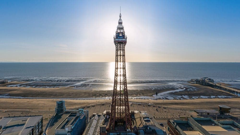 Aerial view of Blackpool Tower and beachfront.