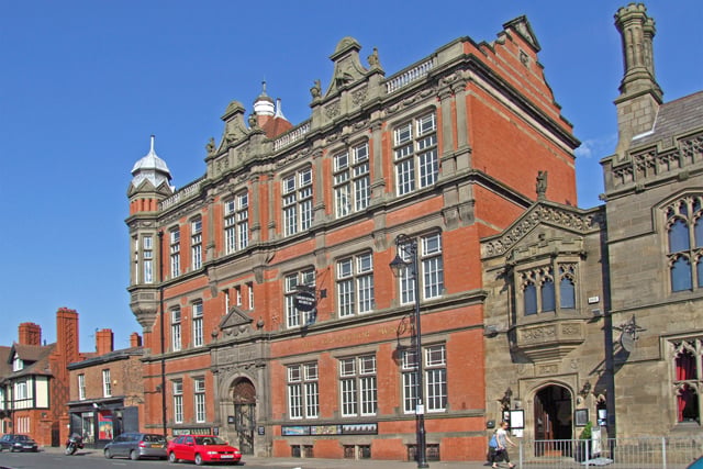 The Grosvenor Museum in Chester, England. A red brick building with ornate details and windows.