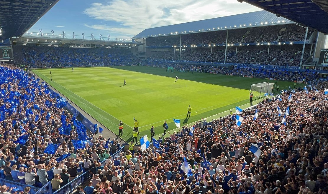 Crowd at a soccer game in a stadium.