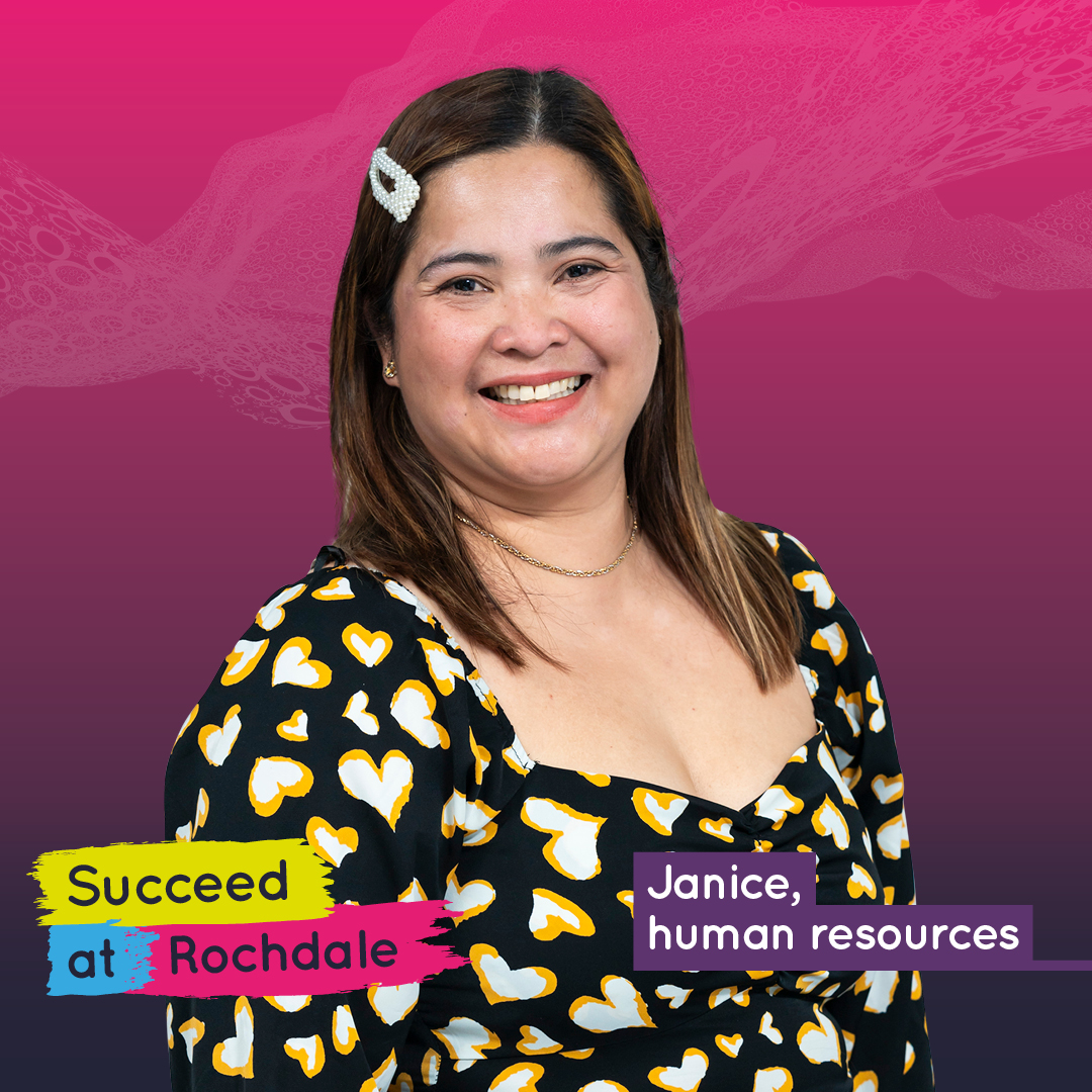 Woman smiling, wearing a heart-patterned top. Text: "Janice, human resources"